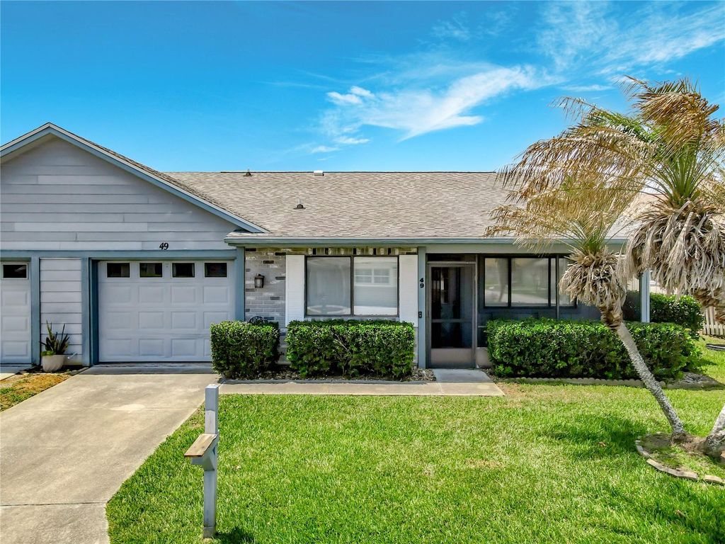 Photo of 49 Bogey Circle, New Smyrna Beach, FL 32168 (MLS # G5111516)