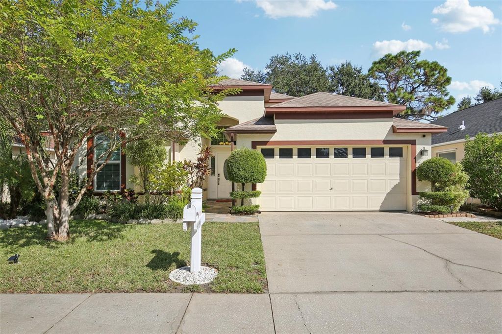 Photo of 14935 Hidden Oaks Circle, Clearwater, FL 33764 (MLS # TB8439557)