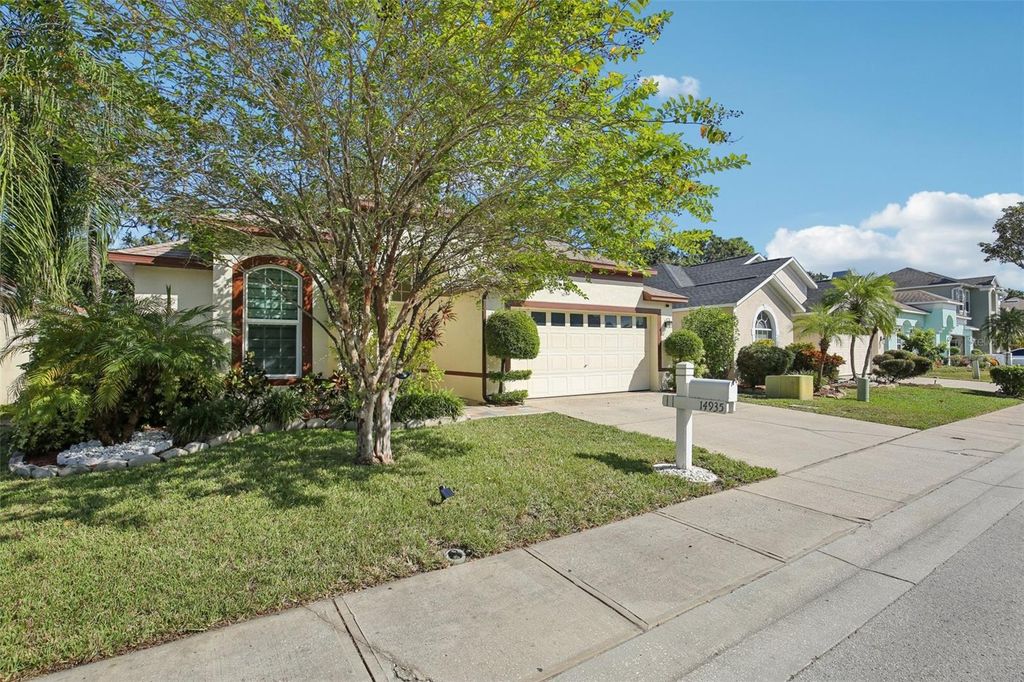 Photo of 14935 Hidden Oaks Circle, Clearwater, FL 33764 (MLS # TB8439557)