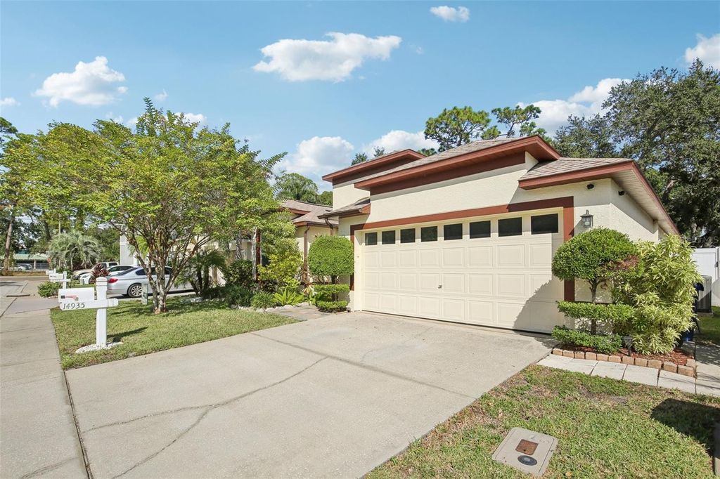 Photo of 14935 Hidden Oaks Circle, Clearwater, FL 33764 (MLS # TB8439557)