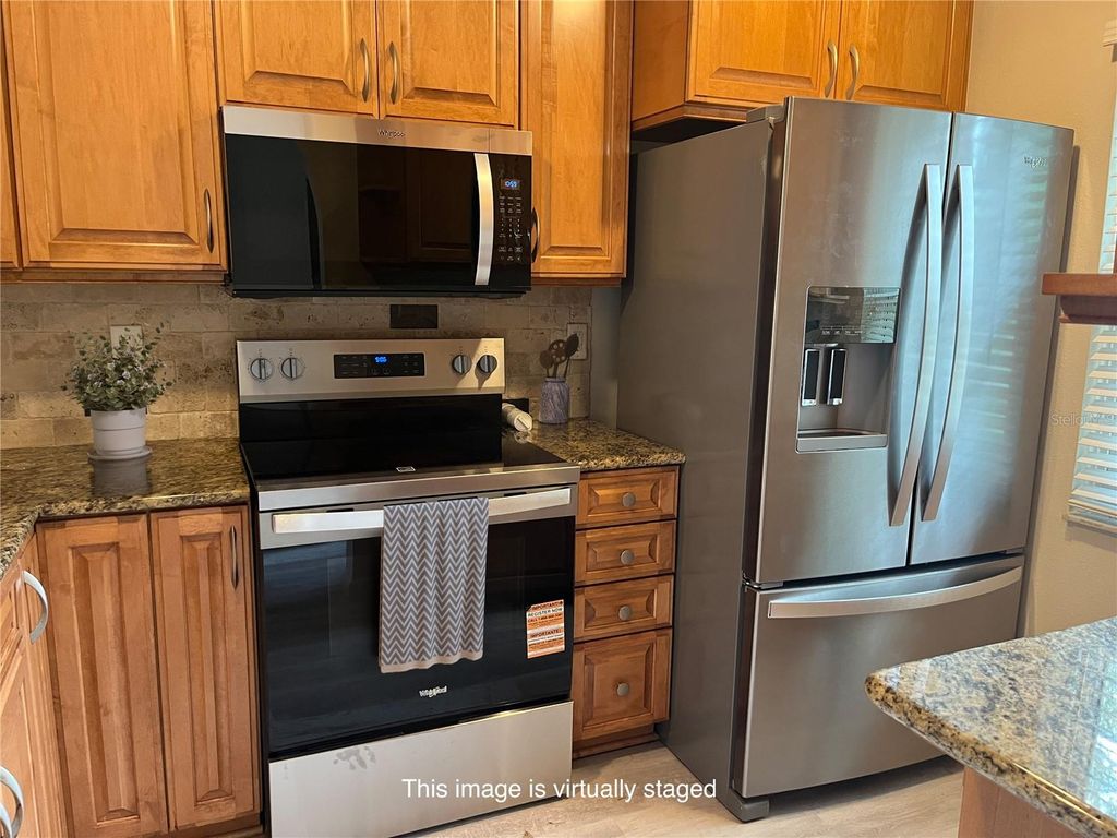 Photo of 3160 Highlands Boulevard #3160, Palm Harbor, FL 34684 (MLS # TB8477790)