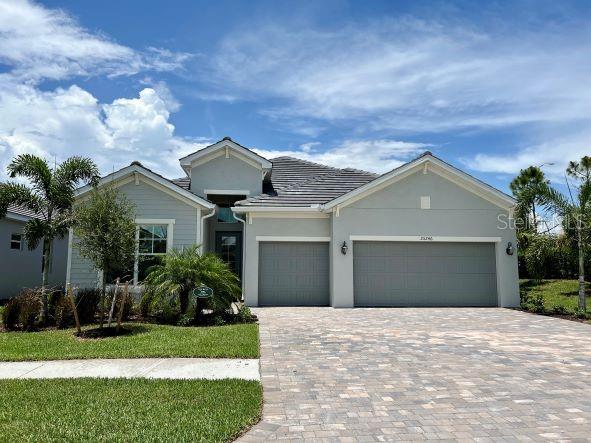 Stunning Luxury 4-Bedroom, 3-Bath Home with 3-Car Garage & Breathtaking Views! This gorgeous 4-bedroom, 3-bath, 3-car garage singlefamily home is the epitome of luxury living, featuring a wide range of spectacular upgrades. From the white shaker cabinets and ornamental
white granite to the stainless steel appliances and plank tile flooring, every detail has been thoughtfully chosen to create a stylish and functional
living space. Step outside and enjoy the outdoor summer kitchen, perfect for entertaining, or take advantage of the impact glass doors and
windows for added durability and peace of mind. Offering incredible golf and water views, this home is truly a retreat, providing both beauty and
tranquility. A Golf Membership Transfer is available, giving you access to Punta Gorda’s premier championship golf course, perfect for golf
enthusiasts seeking a top-tier experience. Heritage Landing is more than just a home; it's a lifestyle! This stunning community offers an
exceptional location just off Burnt Store Road, with quick and easy access to Downtown Punta Gorda, Punta Gorda Airport, Fort Myers, Cape
Coral, and more! Residents enjoy a guard-gated entry, a stunning golf course, and 4 community satellite pools, ensuring both privacy and
leisure. The resort-style community pool features lap lanes for fitness, and the Pool Café serves up a full menu, full bar, and poolside service,
perfect for relaxing in style. For those who love sports and staying active, the community offers 6 Har Tru Tennis Courts, 6 Pickleball Courts, 2
Bocce Courts, a State-of-the-Art Fitness Center, a Separate Aerobics Room, and a Full-Service Spa for ultimate relaxation. Pets are considered
with prior approval, making this a pet-friendly paradise for all to enjoy.