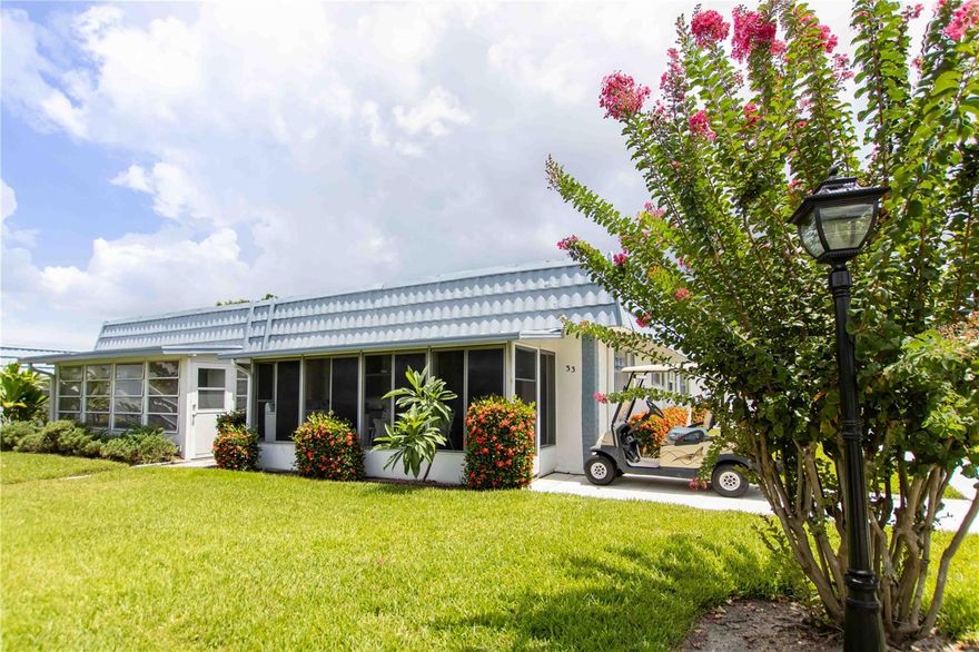 Gorgeous and affordable Two Bed, Two Bath condo in thriving Kings Point. Enjoy the updated LVP flooring throughout, open floor plan, spacious bedrooms, Walk-In Primary bedroom closet, and recently updated Walk-In shower. Living room boast a beautiful custom built in bookshelf to add character and provide additional storage. Private lanai is perfect for enjoying the Florida weather. Condo comes with a community storage unit (pictured) and 1 reserved covered carport.  HOA Fees includes almost everything! Cable, Internet, Water, Trash, Sewer, Lawn Care, Roof Care and Replacement, Exterior maintenance and painting!  Not to mention all of the amazing clubs and amenities Kings point is famous for.  Don't miss your opportunity to own an affordable piece of paradise.  Schedule your showing today!