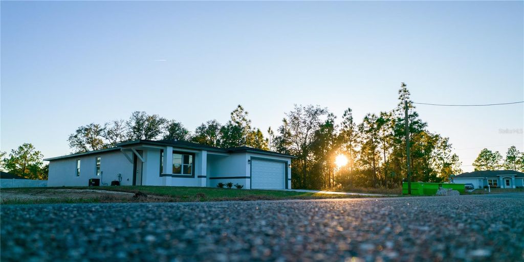 Photo of 10034 N Darwin Way, Citrus Springs, FL 34434 (MLS # O6323139)