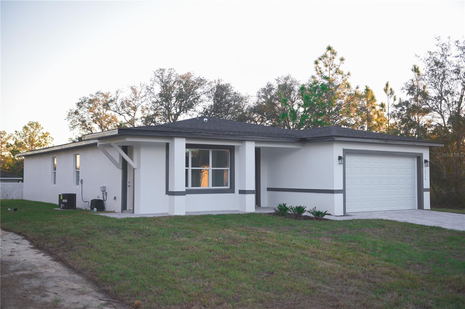 This listing represents 2 units. One main house for 1850 and number 2 is a studio for 1200. They can be rented separately. Brand new and ready to move in, this stunning 3-bedroom, 2.5-bath luxury home—is now available for rent with **no HOA** and unmatched flexibility. This is a bran new property under warranty with foam insulation for energy savings. Water and power will be at the landlord name and each unit will be billed 70% and 30% every month. Enjoy 10-foot ceilings, granite countertops, 42-inch solid wood cabinets, waterproof vinyl plank flooring, upgraded foam insulation, and spacious tile-covered showers. Located just 20 minutes from Ocala, 10 minutes from Dunnellon, and 35 minutes from Crystal River and the west coast beaches, this custom-built home offers both luxury and convenience. Built by Queen Homes, a trusted Central Florida builder since 2013, and includes a 2-10 home warranty.