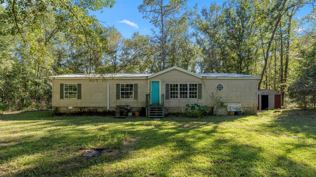 Photo of 4817 NW 244th Avenue, Alachua, FL 32615 (MLS # GC544307)