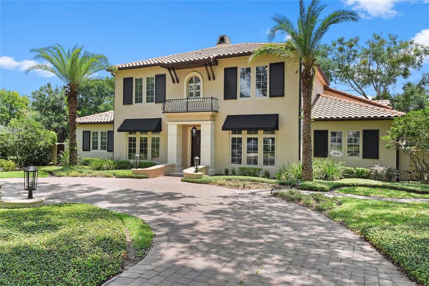 Newly updated and ready for new owner to begin building memories immediately as it is move in ready!
This stately Winter Park residence by Rex-Tibbs Custom on an oversized corner lot on Park Avenue is available for the first time to welcome it’s new owner to peerless luxury!  This 5-bedroom, 5-bath with downstairs office and master, a bonus room and guest wing, is walking distance to restaurants, shops and WP golf course. Double wide circle drive and side garage provide plenty of parking for family and friends to visit.  The spacious foyer welcomes guests with the new designer features of lights, fans plus high ceilings, wood floors, crown molding, shutters, abundance of storage, and built-ins all freshly painted. The foyer opens to the separate living and dining room both with picturesque windows having views to the front.  Nearby is the heart of the home:  a well-appointed chefs eat-in kitchen sporting a large quartz sitting island, stainless built-in appliances including dual ovens and cooktop, walk-in pantry, abundance of cabinetry with new designer selected fixtures, wood floors and a private paver patio- perfect for morning coffee!  The kitchen overlooks the family room and lanai area making it an ideal space for relaxing and entertaining. The bright family room has built-ins, fireplace and 2 sets of French doors to the covered lanai with fans and the resort backyard. A hallway leads to a home office with built-ins, full guest/pool bath and private master wing.  Spacious master retreat has tray ceilings, customized walk-in closet, soaking tub, oversized shower, dual sinks with granite counters and doors to the lanai area.   Upstairs is the ideal bonus space for movies, gaming and homework .2 large bedrooms with walk-in closets share a Jack-n-Jill bath.  Another bedroom and full bath complete the area.  There is a guest wing nearby also accessed by its own stairs off the kitchen!  This guest wing has a spacious bedroom with a Juliet balcony overlooking the resort backyard, updated bath and AC storage.  The backyard is ready for year-round enjoyment with the lanai featuring tongue and groove ceiling, fans, speakers and wet bar overlooking the brick lined resort pool and deck. Plenty of green space with new sod and landscape plus beyond the pool area is ideal for gardening, pets or ball throwing.  The well-equipped indoor laundry room with washer, dryer, utility sink, built-in cabinetry and 2 closets for storage leads to the oversized 3-car garage: with new epoxy flooring, window panels on garage doors and paint!  Zoned for the top WP schools, walk to Park Avenue, and easy access to all of central Florida including downtown, the parks, beaches and airport.
Immaculately cared for and improved for the new owner to enjoy immediately!