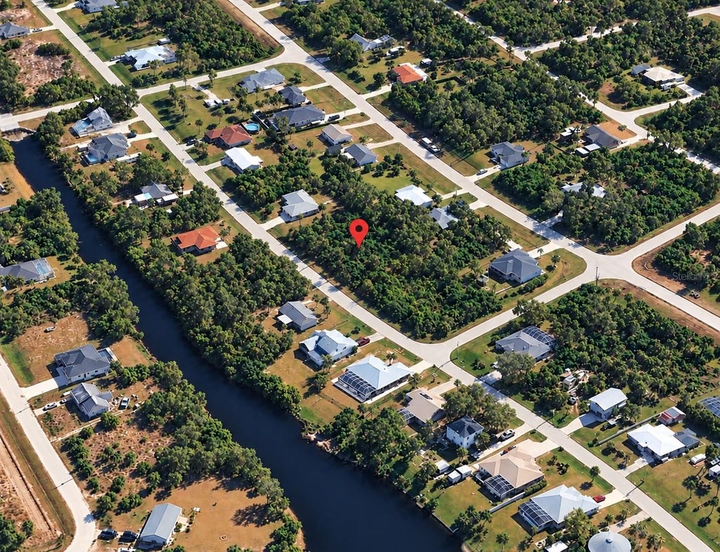 Photo of 11937 Xavier Avenue, Port Charlotte, FL 33981 (MLS # S5159877)