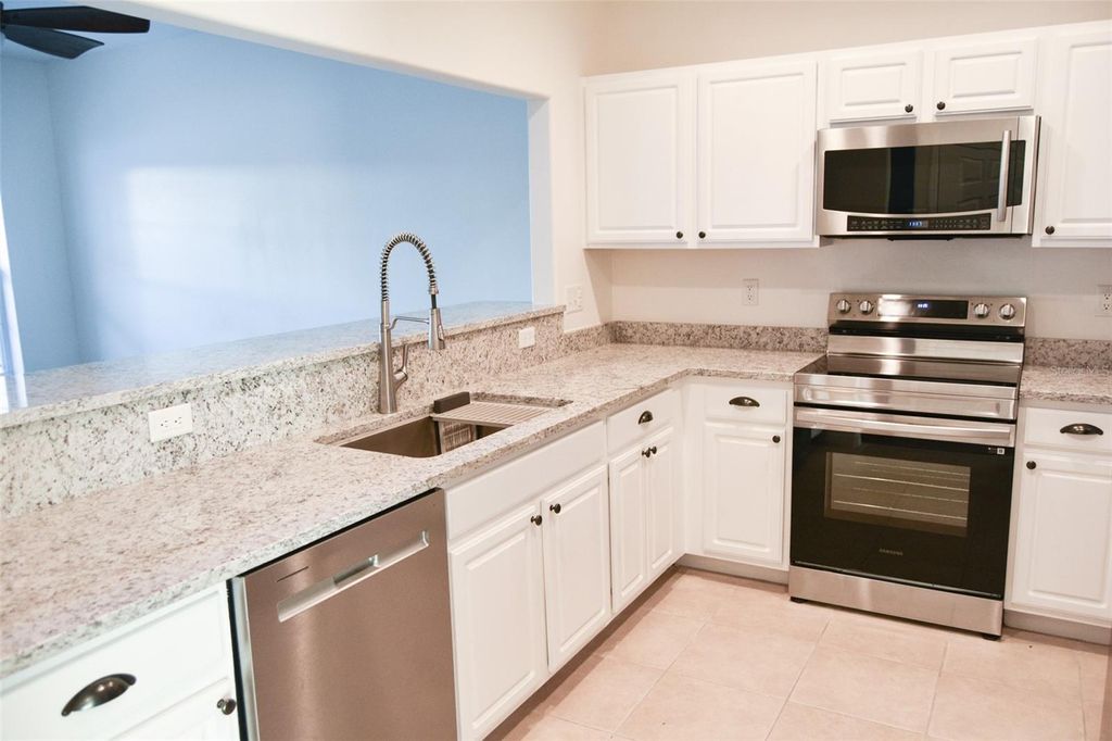 Photo of 930 Woodbridge Ct, Safety Harbor, FL 34695 (MLS # W7876152)