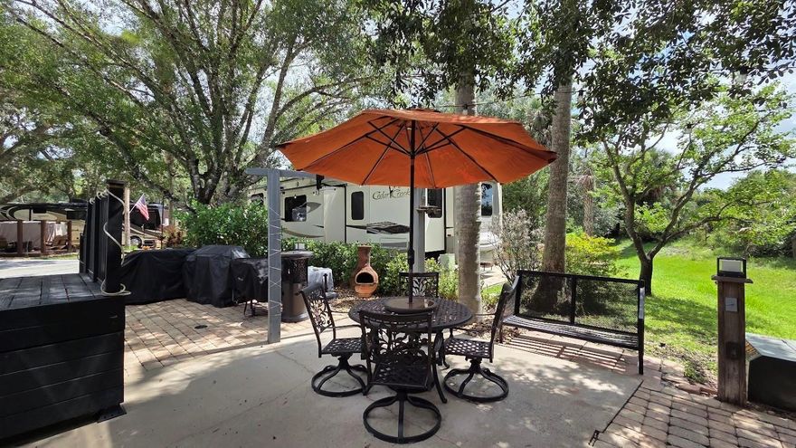 Deeded RV Lot For Sale in Central FL!  Perfect Vacation Lot or Home Away from Home!  This Lot offers a COZY and SHADED seating area, the ability for expansion with room for a pavilion, outdoor kitchen, expanded living space and more!   Easy walk or ride to the Pool, Laundry and Clubhouse.  Plenty of seating for enjoying friends, family and campfire smores!  Rent out when not in use and allow it to pay for itself!  River Ranch RV Resort is perfect for weekend vacations, family camping, seasonal living! River Ranch RV Resort offers beautiful landscaping and privately owned RV lots.  There are many amenities such as Pools, Tennis, Pickleball, Clubhouse, Social Events, Billiards, Poker Room and more! Looking for entertainment and fun? River Ranch offers it here!! For starters, there is a LIVE Rodeo every Saturday night – an excellent display of showmanship and fun for the entire family! There is even a Saloon (family friendly), with LIVE bands, DJs, dance parties and they give line dancing lessons for free. There is a waterpark, an adventure park which has a bounce house, mechanical bull, climbing tower, Arcade, mini golf, outside movie on the greens, bicycle rentals, airboat rides, river boat rides, swamp buggy, hayrides, petting farm, trap & skeet range and a bow target for shooting. There are several places to eat on property. The River Ranch Chop House serves delicious food and drinks, a waterfront Smokehouse Grill serving delicious BBQ, a pizza shop and an ice cream and coffee shop (serving Starbucks.) There is also a General store and a Western store to grab all of your favorite Cowboy/Cowgirl finds! Watch the Bison, Steers, Horses and other wildlife! Don’t forget to check out the Petting Farm!!