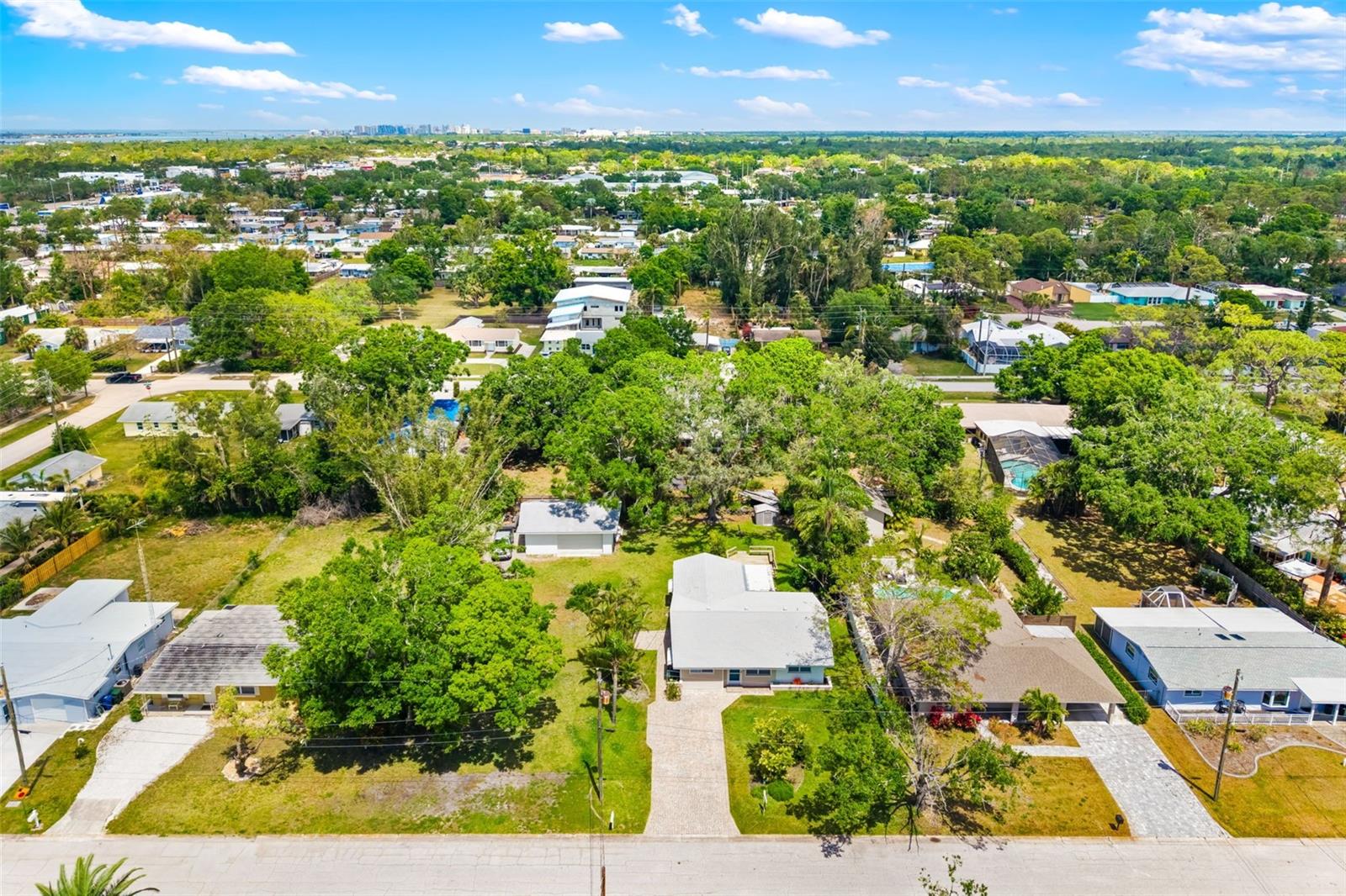 One or more photo(s) has been virtually staged. Unlock the Potential in South Sarasota!
Here’s your chance to build your dream home or investment property in one of Sarasota’s most desirable locations—just minutes from the world-famous sands of Siesta Key and Turtle Beach! This rare vacant lot comes with a solid 30’x24’ workshop/garage already in place, giving builders and investors a valuable head start.720 Sqsft "Block" ( solid block garage) with many window and doors.
With no HOA restrictions to hold you back, this property is a true blank canvas. Whether you're looking to create a custom coastal retreat, a profitable rental, or a modern new build, the possibilities are wide open.
The location is unbeatable—nestled in the heart of South Sarasota right off US41, directly across from The Landings. You’ll enjoy quick access to Phillippi Estate Park, vibrant shopping districts, local restaurants, and, of course, Sarasota’s stunning beaches.
Opportunities like this don’t come often—bring your vision and start building today!