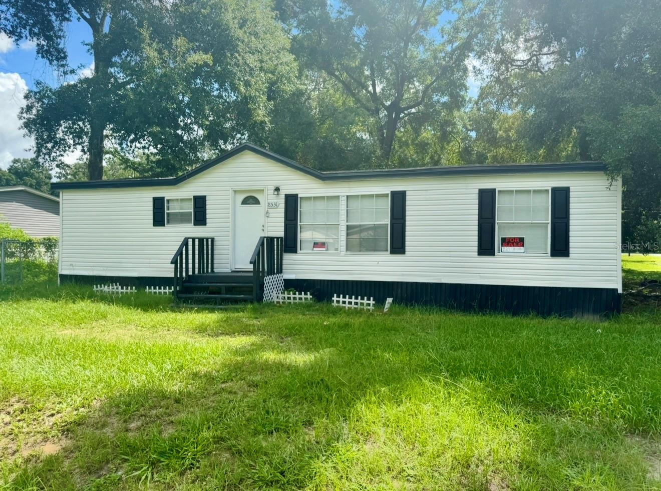 INVESTOR ALERT! Don’t miss your chance to own this charming mobile home, perfect for first-time homebuyers or as an investment. This newly renovated 3 bedrooms, 2 bathrooms offers a cozy living room and open to kitchen. Kitchen fully renovated with brand-new stainless-steel appliances, granite countertops. Freshly painted interiors/exterior. New flooring throughout, and baseboards. Bathroom have been renovated. The roof was redone in 2024. Home is in ready for your family and a little TLC to make it your own! Just few mins from Downtown Ocala and all the surrounding areas! Come check this one out today as it won’t last long!-- Schedule your visit today before it’s too late!