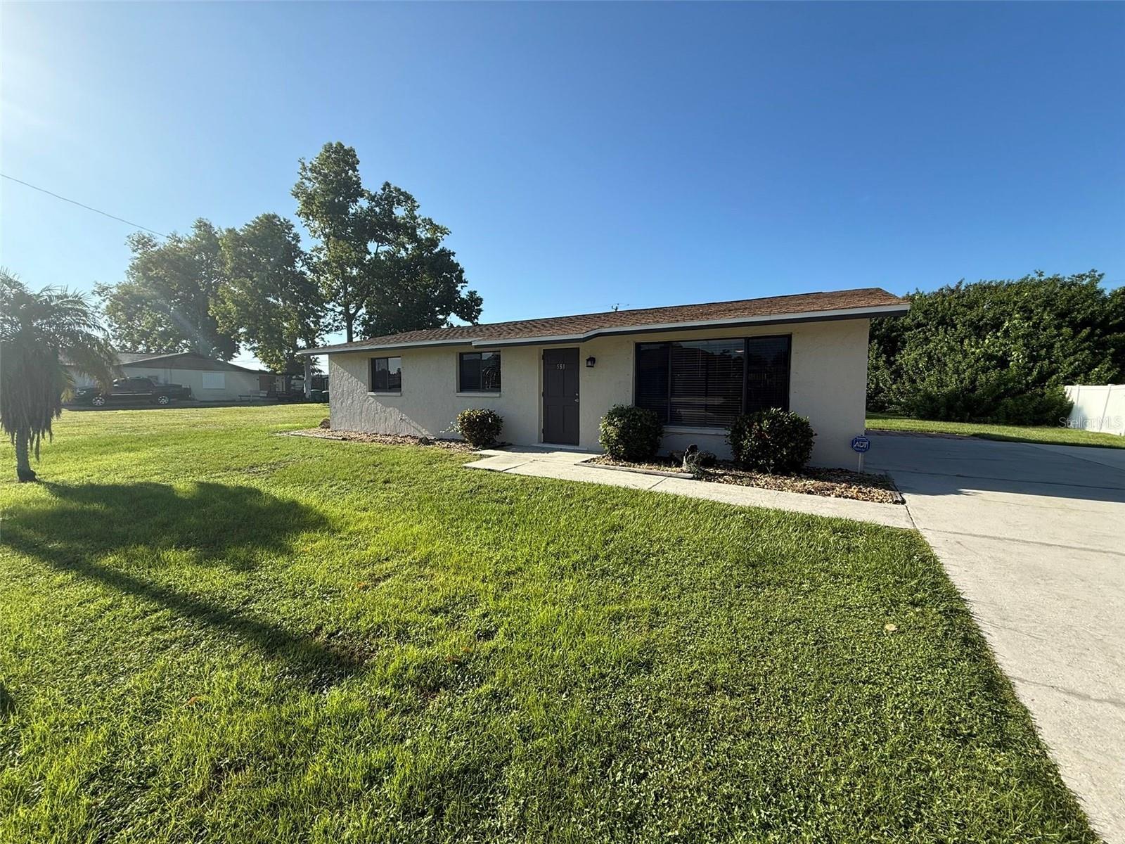 Move in ready 3 bedroom 2 bathroom home w/ a screened lanai. Laundry room w/ washer & dryer included. Updated kitchen with granite countertops and white cabinets. Extended parking with an extra wide driveway. This well maintained gem won't last long. Hurry & schedule your showing today.