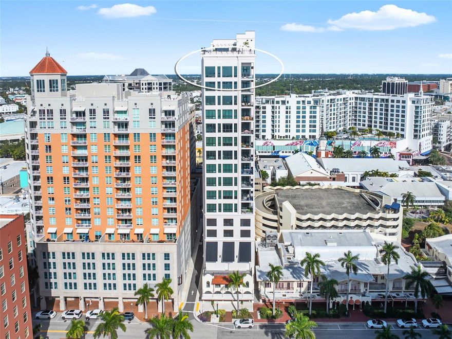 UNPARALLELED LUXURY HIGH ABOVE SARASOTA BAY!! Are you looking for the best views in Sarasota? Look no further...Soaring 17 stories above Sarasota's most coveted address, this extraordinary 3,407-square-foot residence redefines elegance. Residence 1701 at 33 South Palm Avenue presents a rare opportunity to own one of the finest penthouses in Sarasota, where breathtaking panoramic views meet impeccable Italian craftsmanship. From the moment you enter, floor-to-ceiling windows framed by 12-foot ceilings unveil a mesmerizing 360-degree canvas. Watch sailboats glide across Sarasota Bay, admire the barrier islands stretching toward the Gulf of Mexico, observe the vibrant marina below, and take in the glittering city skyline. These aren't just views—they're an ever-changing masterpiece visible from every room. The gourmet kitchen stands as a testament to culinary excellence, featuring custom Italian cabinetry, premium Miele cabinet-panel appliances including gas cooking, dual ovens, and dual dishwashers. Quartz countertops and walls provide both beauty and durability, while a full standing freezer in the walk-in pantry ensures you're always prepared for any occasion. Wine connoisseurs will marvel at the custom 2,500-bottle climate-controlled wine room—a sophisticated showcase for your collection and the perfect conversation piece for entertaining. This three-bedroom haven offers ultimate privacy with en-suite bathrooms for each bedroom, all appointed with spa-like finishes that transform daily routines into restorative rituals. A dedicated office with a private balcony and custom built-in wall units and desk provides the perfect work-from-home sanctuary, while a convenient powder room accommodates guests. The living spaces feature custom built-in entertainment centers and bar cabinetry, seamlessly integrating technology and function with Italian design sensibility. Ascend to the rooftop oasis where a sparkling pool, spa, and outdoor kitchen await against a backdrop of endless sky and sea. The rooftop lounge with catering kitchen makes entertaining effortless, while the fitness center keeps you at your best. Two assigned valet parking spaces ensure convenience and security. This is more than a residence—it's a front-row seat to Sarasota's cultural renaissance, steps from world-class dining, performing arts, and the marina. Experience the pinnacle of luxury living where every detail has been carefully considered and every view takes your breath away.
