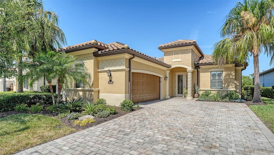 Beautiful two bedroom, two and a half bath (plus a den) single family home offers peace and tranquility with stunning views of the lake. Enjoy hassle free, Simple elegance in this beautiful, organic themed single family home located in the much sought after gated community of Lakewood National Golf Club, which boasts 2 champion golf courses and hosts the prestigious LECOM Annual PGA Suncoast Classic among other events. This beautiful home offers a stunning open floor plan, with unrivaled water views upon entering courtesy of your tropical pool/spa’s invisible picture screen. The spacious master suite is cleverly located at the back of the home to maximize the beautiful picturesque water views directly from bed and features double walk-in closets and ensuite bathroom, with welcoming soaking tub, double sinks and walk/in shower .The pool/spa area features an outdoor grill, TV and the latest technically advanced quiet heating system, as well as an outdoor half-bath. Elegant new custom lighting, central air system and other upgrades are featured throughout. Be our guest and enjoy the simple pleasures of Florida resort style living without the stress and worry in your own private oasis. Furniture can be removed as this home is offered unfurnished as well. ALL Clubhouse amenities transferable, Comes with an electronic vehicle gate pass. Golf cart can be rented for an additional fee, & Pool maintenance, lawn care and Organic pest control included.