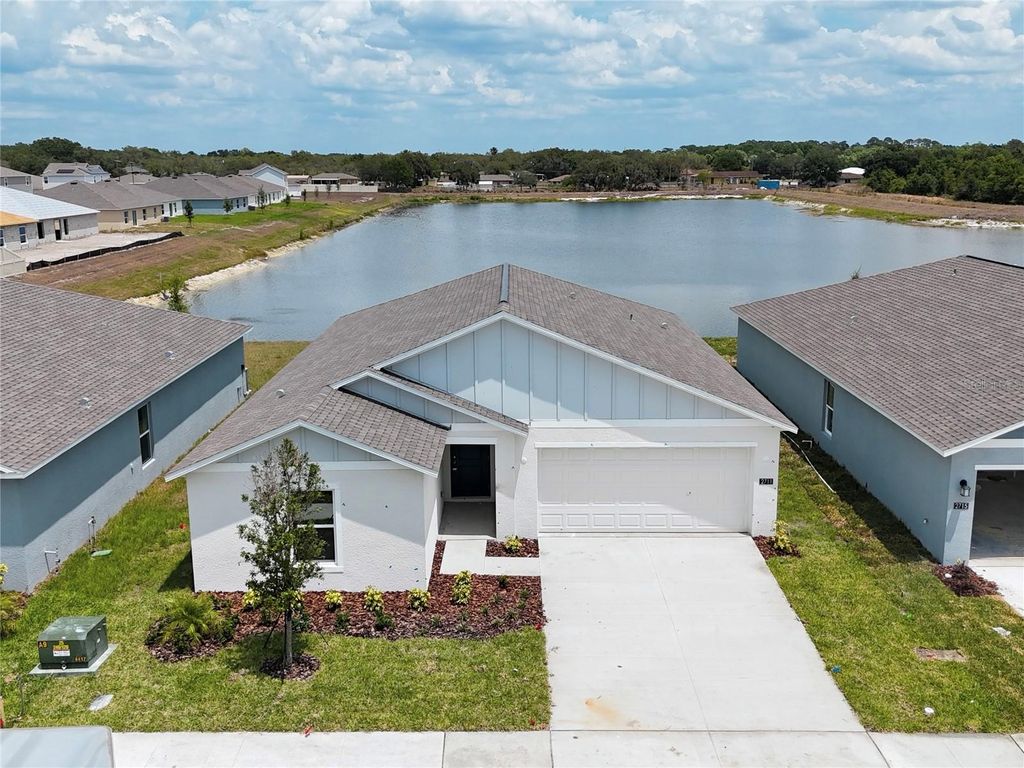 Photo of 2711 Pioneer Trail, Eagle Lake, FL 33839 (MLS # O6403102)