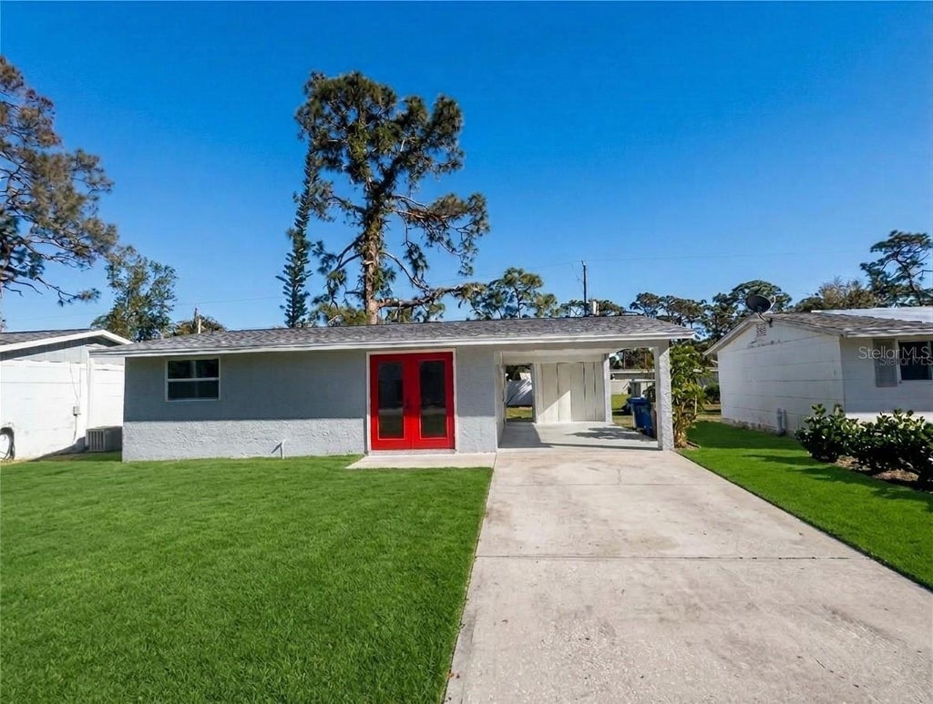 Photo of 735 Bertrend Street, Englewood, FL 34223 (MLS # TB8328697)