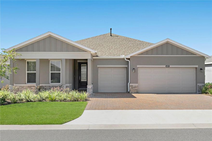 Step into the elegance of Ocala Preserve living with this former Shea Homes model, a 2023-built residence designed to impress at every turn. Located in one of Ocala’s premier 55+ gated golf communities, this property blends modern sophistication with a vibrant, active lifestyle. From championship golf and miles of walking trails to a full-service spa, fine dining, and fitness facilities, the amenities here are second to none. Showcasing more than $120,000 in high-end upgrades, this home was built as a showcase—and it still feels like one today. The open-concept layout spans 3 bedrooms, 3 bathrooms, and a dedicated office, all enhanced with designer details. Ceramic tile flooring flows underfoot, while custom lighting, upgraded counters, and fine finishes give every room a polished touch. Guests will love the private in-law suite, complete with its own full bath, while the oversized laundry room makes daily routines effortless with cabinetry, folding space, and a utility sink. The gourmet kitchen—outfitted with top-of-the-line appliances—opens seamlessly to the living area, creating a bright and welcoming space for entertaining or simply relaxing at home. The owner’s suite is a retreat unto itself, featuring a walk-in custom closet and a spa-worthy bathroom with dual vanities and stunning tile finishes. Step outside to a screened-in lanai, ideal for enjoying your morning coffee or unwinding at sunset. And with a 3-car garage, there’s room for cars, storage, and even a golf cart. Perfectly maintained and move-in ready, this home offers both luxury and convenience in one of Ocala’s most sought-after communities. Beyond the walls of this stunning home, Ocala Preserve has so much to offer. Residents enjoy a true resort-style atmosphere, complete with on-site dining, a refreshing resort pool, and a state-of-the-art fitness center. Outdoor lovers will appreciate the pickleball and tennis courts, bocce ball, and miles of trails that wind through lakes and preserved green space. The community’s signature championship golf course, designed by Tom Lehman, offers a premier experience for golfers of all levels. With a vibrant calendar of clubs, events, and social gatherings, Ocala Preserve provides not just a home—but a lifestyle full of opportunities to connect, explore, and thrive. Schedule your private tour today and see why life at Ocala Preserve is truly unmatched.