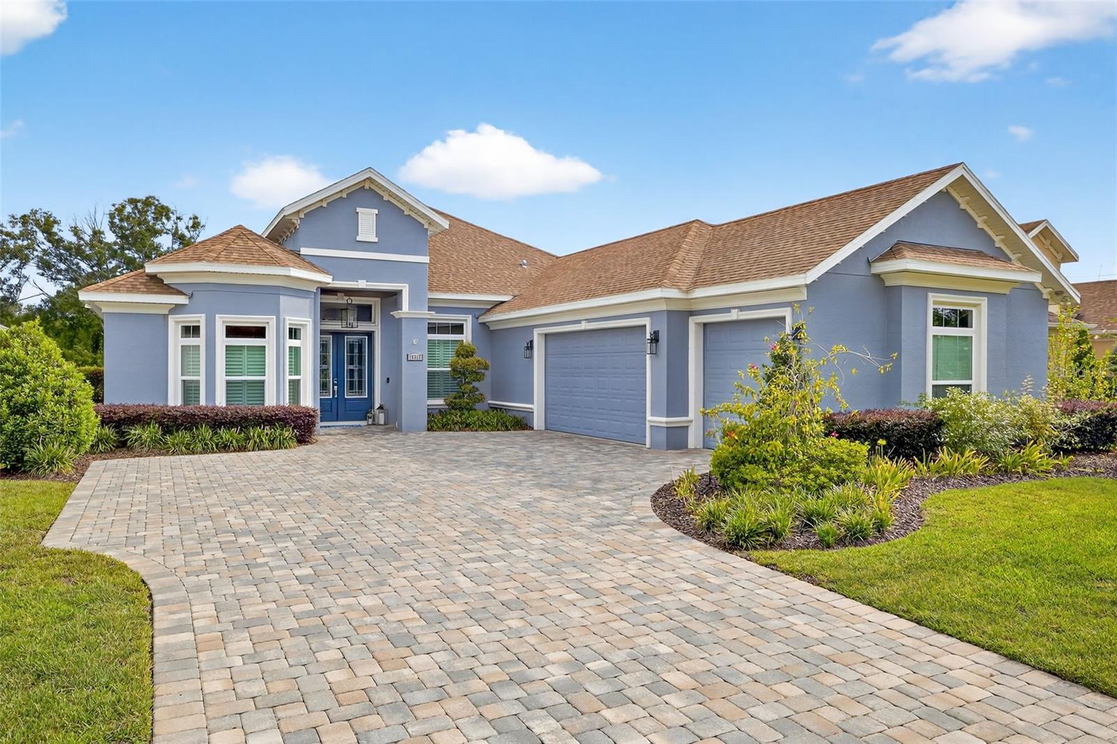 To experience a look absent of the feel is to know the difference between quality and that which imitates it. Come appeal to all your senses in this custom crafted, richly appointed Carrollwood area home. When you open the door to this expansive and inviting floor plan you will be immediately captivated by 10' ceilings and engineered hardwood flooring throughout (except tiled bath and laundry room.) Leaded glass entry doors, extensive crown moldings a generous gathering room with waffled tray ceiling, 8' solid core interior doors, exceptional cabinetry, luxury master bath and chef inspired island kitchen combine to serve the palpable difference between custom quality and today's more typical tract built options available at similar prices. Beyond the many quality, builder features, you are sure to appreciate the seller added plantation shutters, surround sound, exceptional plumbing fixtures, and exquisite lighting and fans found throughout. The original kitchen granite yielded to Level 4 Caesarstone quartz counters (also featured throughout the home.) New awe inspiring backsplash, a Franke granite farm sink, Moen Professional touchless faucet, Wolf gas cooktop and GE Profile series built-in oven/microwave were also added. In support of outdoor utility and enjoyment, you will love the large paver lanai and deck that surrounds the salt water pool and entertainment area covered by a 55' birdcage equipped with panoramic super screens and built in crossbeam Nebula lighting. A more than 700 sq ft 3-car garage, multi car paver driveway, water softener and Generac whole house generator complete this exceptional property. All of this presents with a rare opportunity to own newer construction within a high demand area with an old time neighborhood feel absent of high fees.
