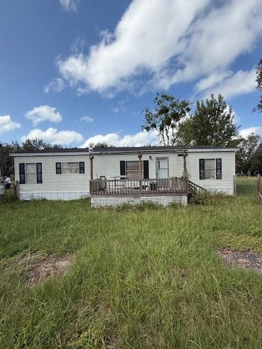 Welcome to 4468 California Dr, a special property with endless potential. Situated on 2.5 flat acres, this home offers plenty of room to spread out along with two barns, a shed, and two animal pens—ideal for animals, storage, or hobbies. Recent updates include a newer roof (2019) and AC system (2022), providing peace of mind for the future. The home is ready for your personal touches and a little TLC to make it truly shine. Enjoy the quiet rural lifestyle while still being conveniently close to town.
