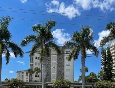 WHAT A BEAUTY! Completely remodeled, turnkey, beachfront condo with gorgeous Gulf views from your covered, screened patio. Enjoy the modern kitchen with stone countertops, sleek cabinetry, and modern appliances. The en-suite is a lovely retreat complete with an ample walk-in closet and roomy, sleek modern bath. The great room is spacious and beautifully appointed, with a convenient hallway half bath. Perfect for entertaining! Nothing will beat the views and sunsets from your patio. The Lido Ambassador is steps from the white sands of Lido Beach, providing private beach access. Plus, enjoy the sparkling pool complete with beach views. Convenient laundry facility on site, as well as fitness room and clubhouse. Unit also includes a covered parking spot. Enjoy the fine dining and shopping of St. Armand's Circle just moments away.