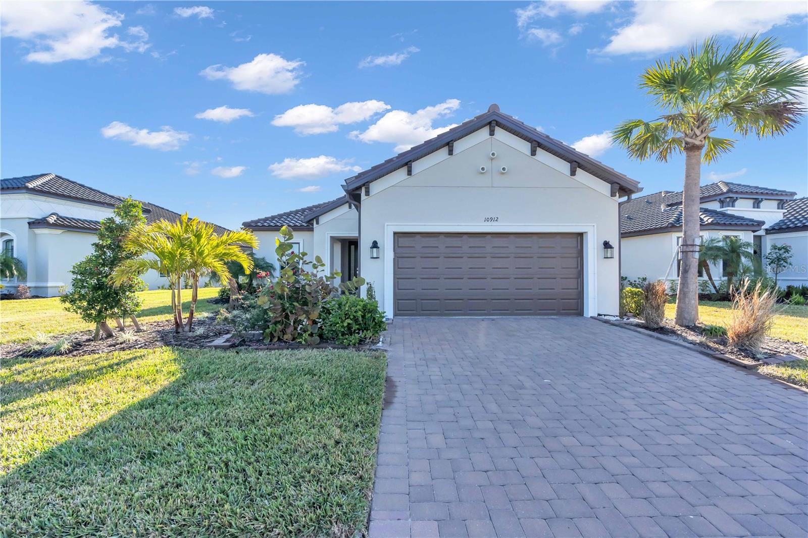 Under contract-accepting backup offers. Experience resort-style living in the vibrant Esplanade at Artisan Lakes community, nestled in the heart of Palmetto, Florida.
This exceptional Taylor Morrison home is just three years old and feels nearly brand new. It features three spacious bedroom suites—yes, each with its own en suite bathroom, there is a convenient half bath near the laundry room, and a versatile den/study.
Enjoy peaceful pond views from the front of the home, adding to the serene and inviting atmosphere. Located near Tampa, St. Petersburg, and Sarasota, this home offers the perfect blend of luxury and convenience.
Inside, you’ll find elegant wood-look tile throughout, stylish quartz countertops, cabinetry, a tankless water heater, and gutters already installed. From the moment you enter, you’re greeted by tray ceilings in the foyer and an open-concept floor plan that seamlessly blends style and function.
The gourmet kitchen is a culinary enthusiast’s dream, featuring top-of-the-line stainless steel appliances, a gas cooktop, and a spacious island—ideal for dining, meal prep, and entertaining.
Step outside to the expansive lanai enclosure, perfect for relaxing or hosting guests. Best of all, the home offers added privacy with no backyard neighbor—allowing you to fully enjoy the lush greenery and serene wooded views.
Esplanade at Artisan Lakes offers a wealth of amenities, including a fitness center, resort-style pool with cabanas, hot tub, and resistance pool. Enjoy community events organized by the on-site lifestyle manager, or take advantage of recreational activities like tennis, pickleball, and bocce ball.
Nature lovers will appreciate the nearby walking trails, dog parks, playground, and butterfly garden.
As a resident, you’ll benefit from an HOA that covers cable TV, internet, and yard maintenance, giving you more time to enjoy the unmatched lifestyle this community offers.
This home is a rare opportunity to embrace resort-style living every day, complete with tranquil pond views and elegant features throughout.
Schedule your private showing today—you’re going to love this home!