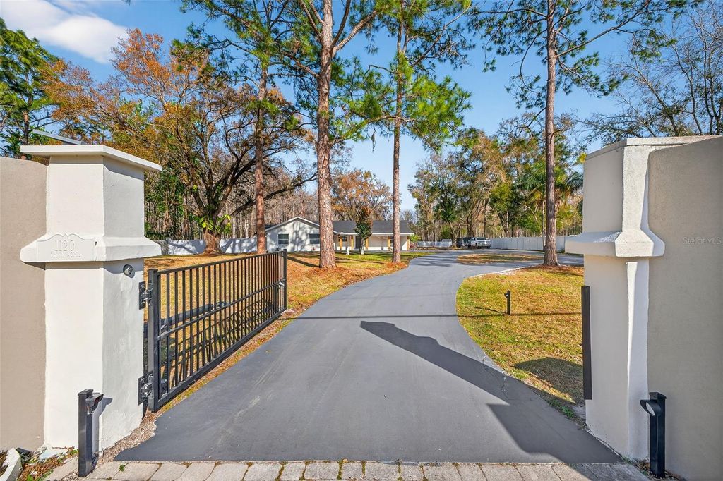 Photo of 1120 Country Lane, Lutz, FL 33558 (MLS # TB8481183)