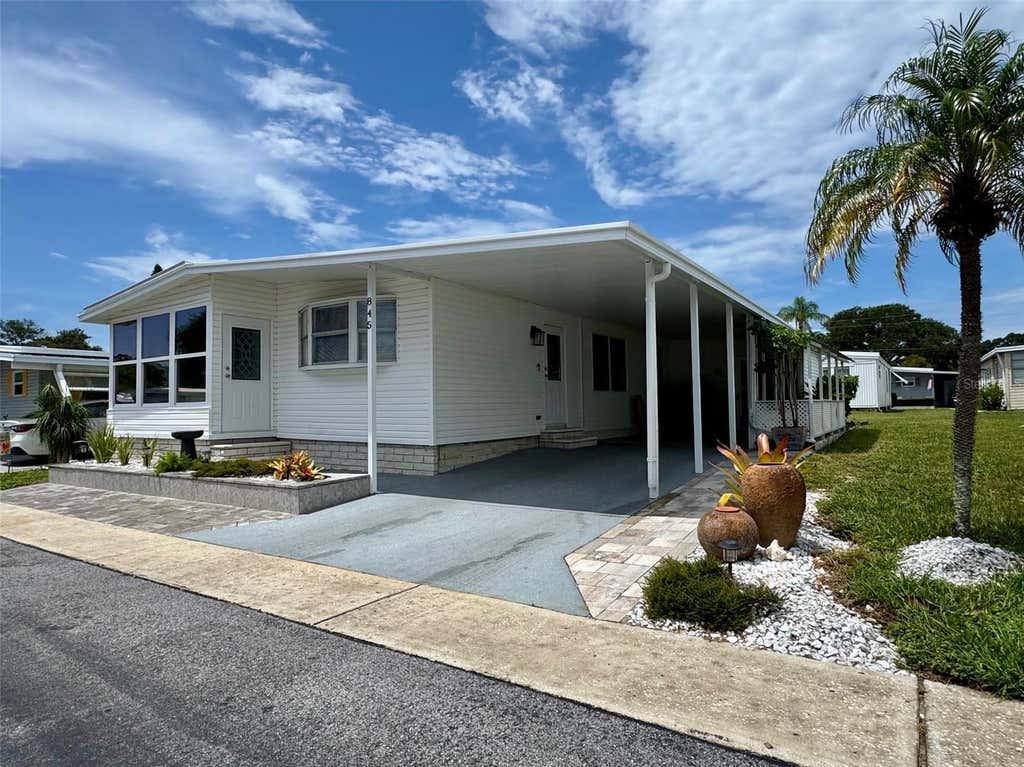 Photo of 845 Cane Palm Street, Largo, FL 33778 (MLS # TB8541667)