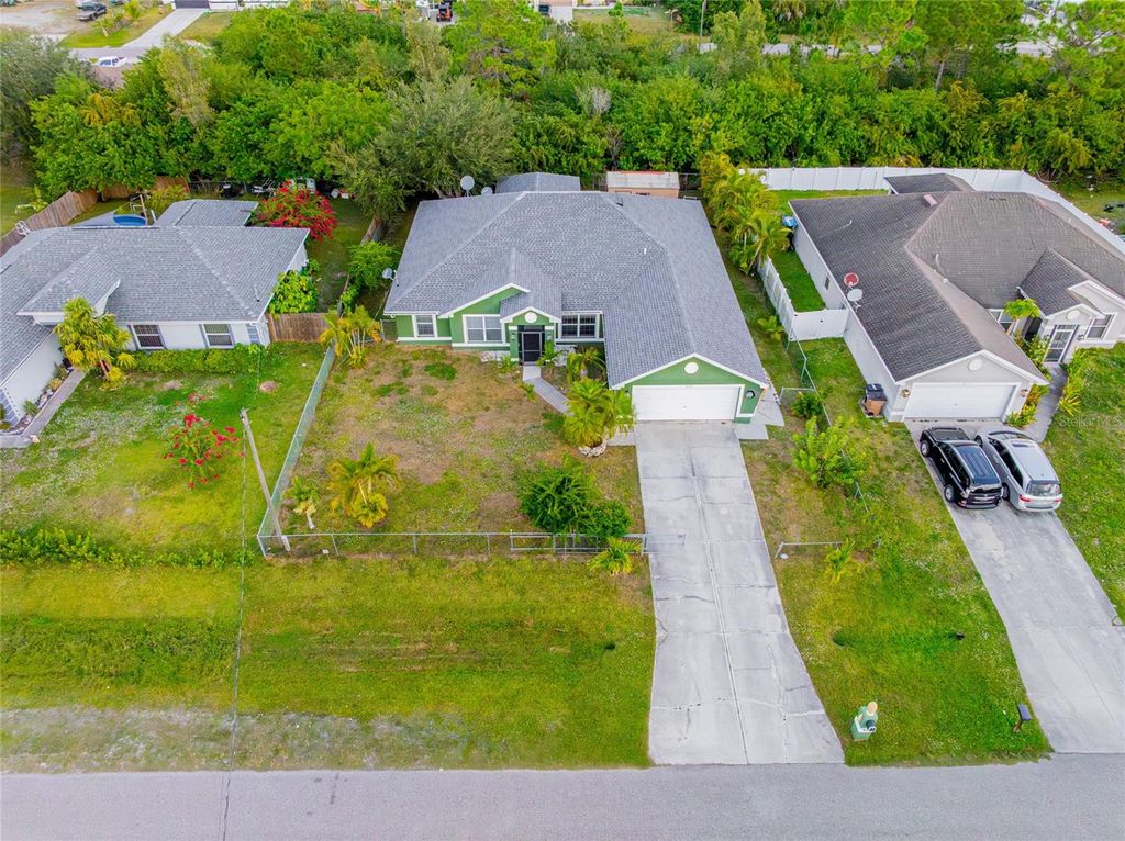 Photo of 418 Windermere Drive, Lehigh Acres, FL 33972 (MLS # TB8458977)