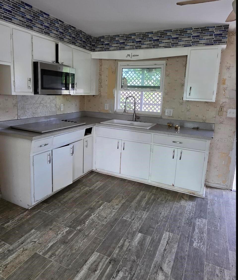 Photo of 2403 Adrian Avenue, Largo, FL 33774 (MLS # O6428062)