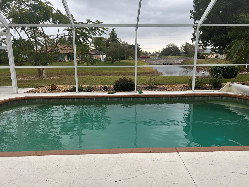 Photo of 24 Broadmoor Lane, Rotonda West, FL 33947 (MLS # D6145812)