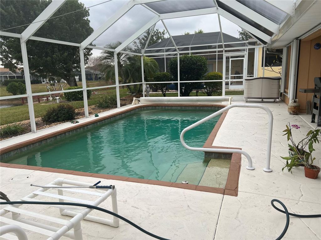 Photo of 24 Broadmoor Lane, Rotonda West, FL 33947 (MLS # D6145812)