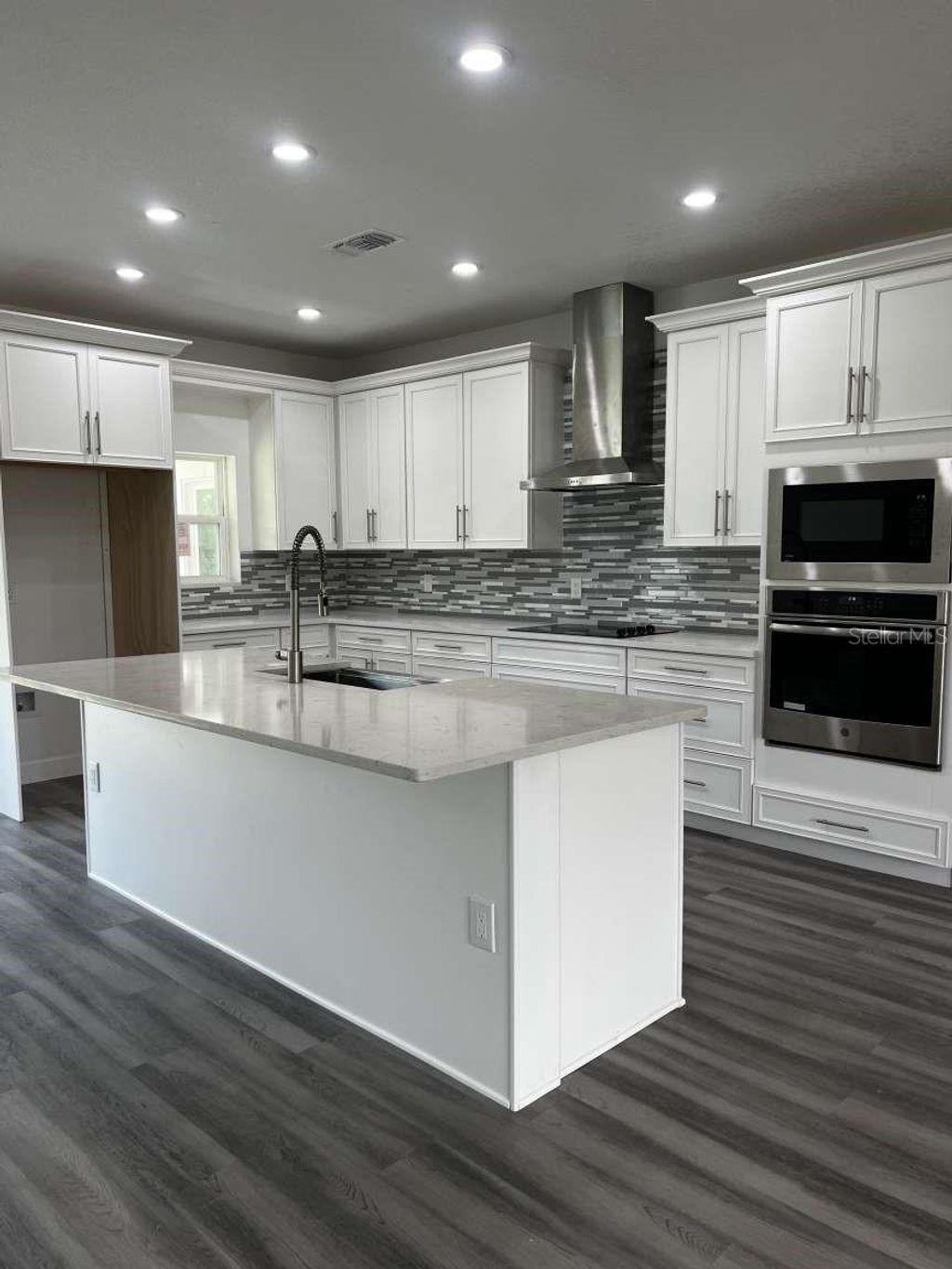 Photo of 32835 Forest Avenue, Leesburg, FL 34788 (MLS # TB8442678)