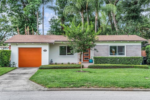 Photo of 303 E Jersey Street, Orlando, FL 32806 (MLS # O6414987)