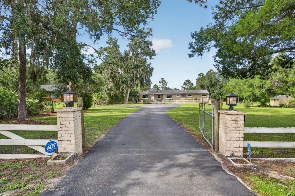 Photo of 20963 E Colonial Drive, Christmas, FL 32709 (MLS # O6440384)