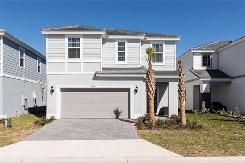 Photo of 7195 Oakmoss Loop, Davenport, FL 33837 (MLS # O6399547)