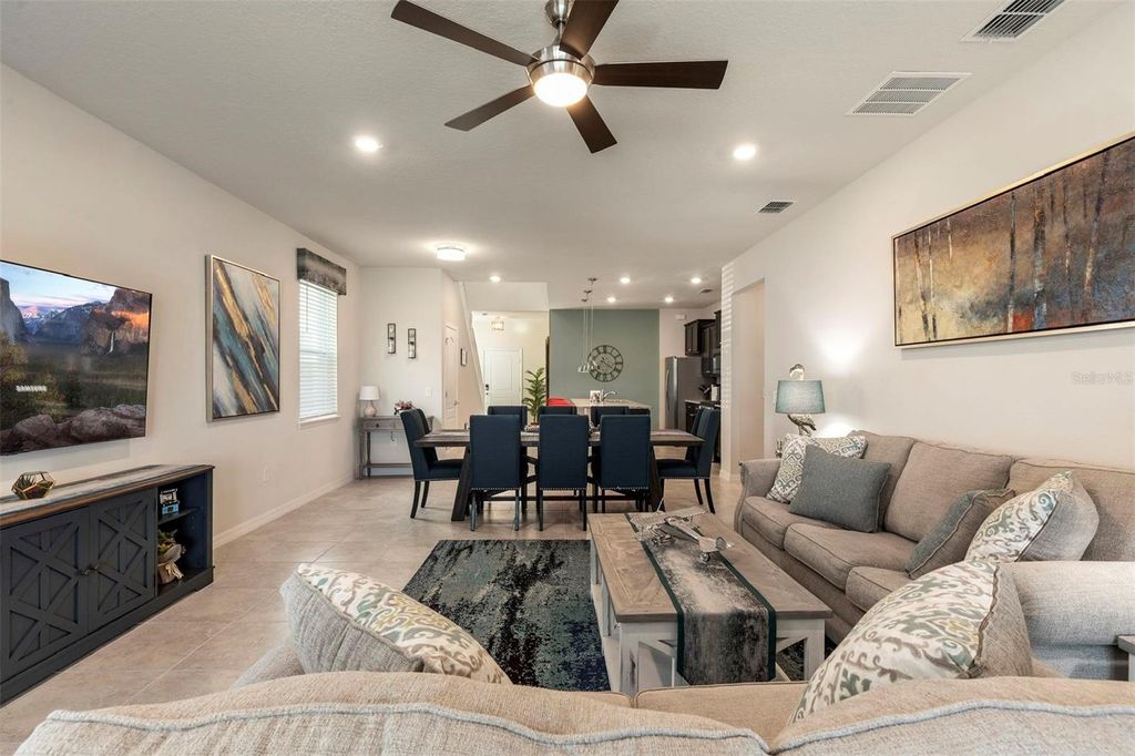 Photo of 7195 Oakmoss Loop, Davenport, FL 33837 (MLS # O6399547)