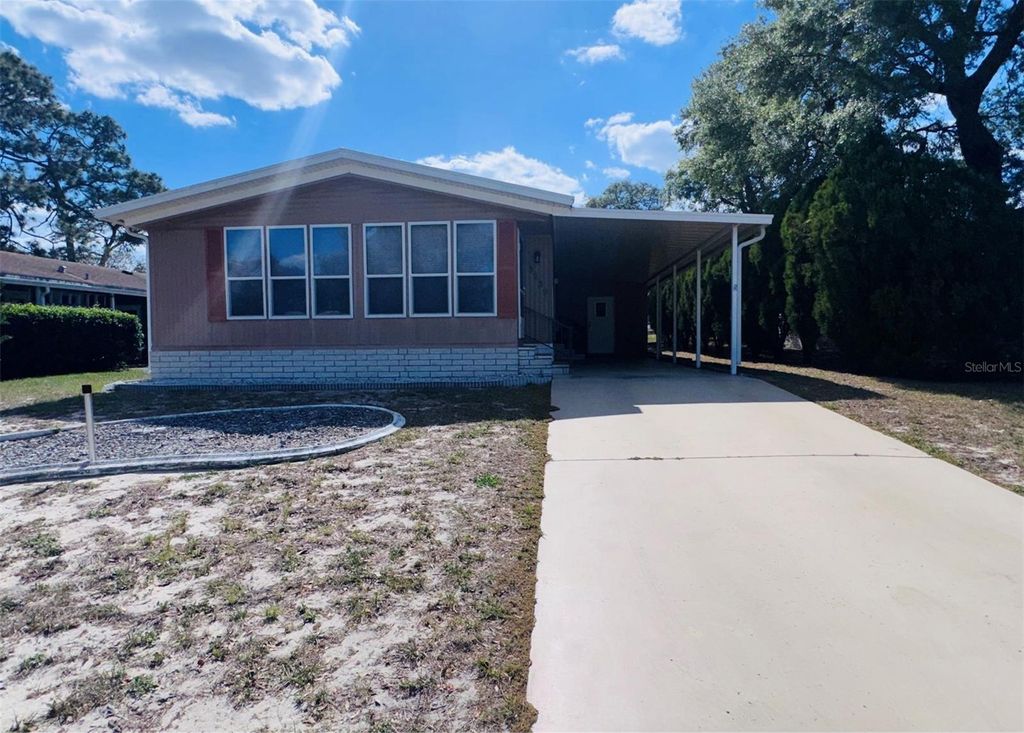 Photo of 8239 Ridge Dale Avenue, Brooksville, FL 34613 (MLS # TB8500569)