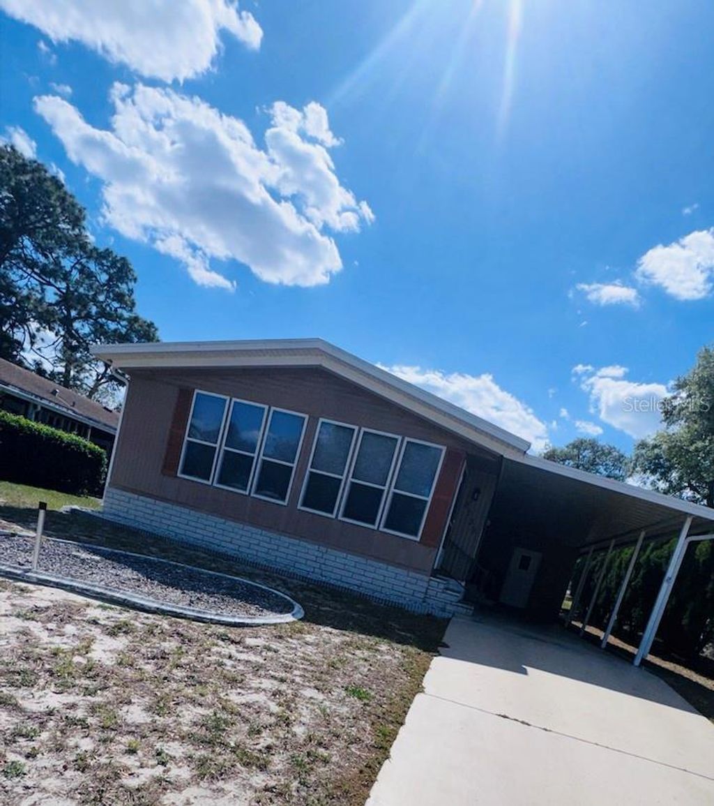 Photo of 8239 Ridge Dale Avenue, Brooksville, FL 34613 (MLS # TB8500569)