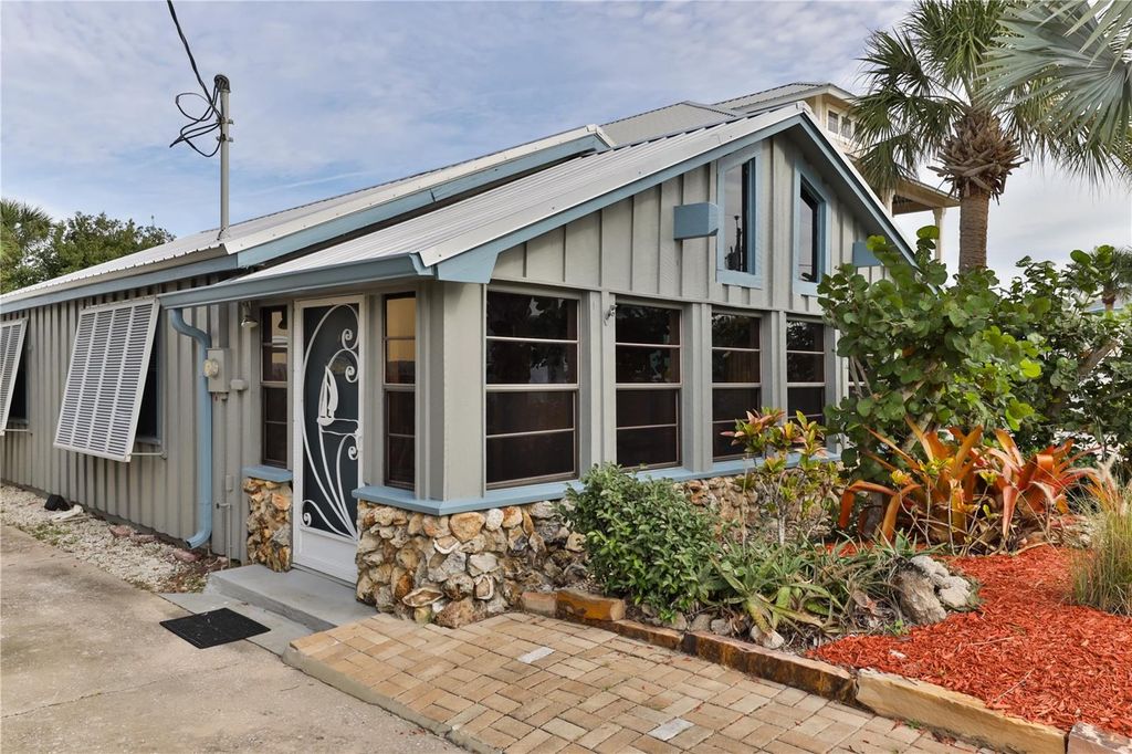 Photo of 314 Due East Street, New Smyrna Beach, FL 32169 (MLS # NS1087877)