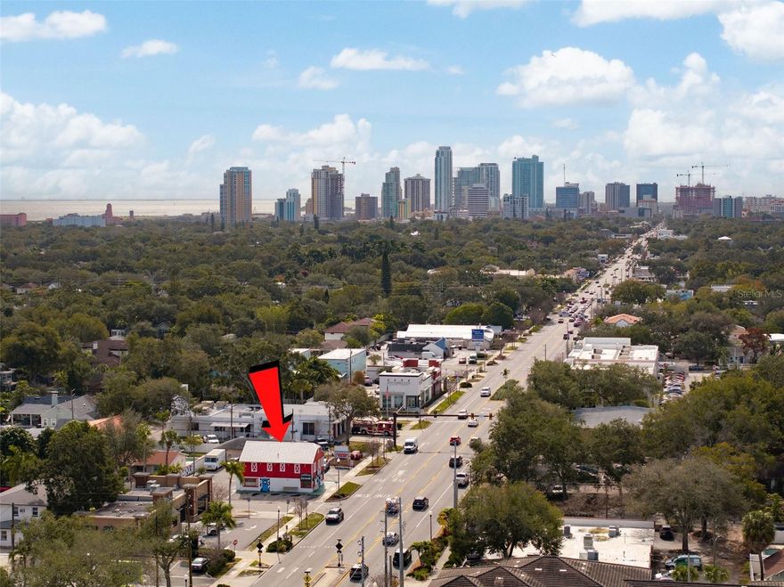 Welcome to the iconic Old Farmer's Creamery Ice Cream Shop property, a versatile gem poised for redevelopment in the heart of Saint Petersburg, Florida. This unique commercial real estate offering combines a charming main structure, currently housing the beloved ice cream shop, with additional income-generating studio apartments and office spaces. Here's your chance to make this property the next landmark in the flourishing landscape of downtown Saint Petersburg.
Key Features:

The Old Farmer's Creamery Ice Cream Shop:
Well-established and loved by the community.
Prime ground floor commercial space, perfect for a variety of business ventures.
A nostalgic atmosphere that can be retained or reimagined for new purposes.

Studio Apartments on the 2nd Story:
Two fully leased studio apartments generating consistent monthly income.
Ideal for investors seeking immediate returns.
Month-to-month leases provide flexibility for redevelopment plans.

Additional Structure with Office Spaces:
Three office spaces, one currently leased to a barber shop.
Existing tenants express willingness to remain in place, ensuring ongoing revenue.
Versatile spaces suitable for various professional services.

Strategic Location:
Minutes away from downtown Saint Petersburg, providing easy access to a vibrant urban center.
Proximity to I275 for convenient transportation links.
A mix of commercial and residential properties in the surrounding area ensures a dynamic business environment.

High Traffic Count:
Located on 4th Street North, this property benefits from a high traffic count.
Excellent visibility for businesses seeking exposure to a diverse customer base.

Redevelopment Potential:
Unlock the full potential of this property with a strategic redevelopment plan.
Capitalize on the dynamic market and demand for prime commercial space in the area.

Don't miss out on this outstanding opportunity to reshape the future of 2531 4th Street North! Whether you envision a new retail hotspot, trendy offices, or a mixed-use development, this property provides a solid foundation for success. Contact us today to schedule a viewing and explore the endless possibilities awaiting you in this sought-after Saint Petersburg location.
