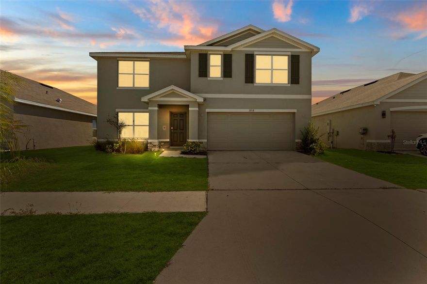 Welcome to this stunning 2023 built home in the highly sought after Berry Bay community of Wimauma! This spacious two-story residence offers 5 bedrooms, 3.5 bathrooms, and over 2,600 square feet of thoughtfully designed living space.

The open concept floor plan features a bright and airy great room, seamlessly connecting to the modern kitchen equipped with granite countertops, stainless steel appliances, and ample cabinetry, perfect for both everyday living and entertaining. Durable ceramic tile flooring enhances the main living areas, while plush carpeting adds comfort to the bedrooms.

Upstairs, the generous primary suite provides a relaxing retreat with a large walk-in closet and en-suite bath. Additional bedrooms offer flexibility for guests, a home office, or growing households.

Constructed with all concrete block on both levels for added durability and energy efficiency, this home also includes smart home technology, central HVAC, and a 2-car garage.

Situated on a 6,000 sq ft lot, residents enjoy access to community amenities including a clubhouse, resort style pool, and playground. Conveniently located near US-301 and I-75, offering easy access to Tampa, St. Petersburg, and Sarasota.

Don’t miss the opportunity to own a nearly new home in one of Wimauma’s fastest-growing communities!