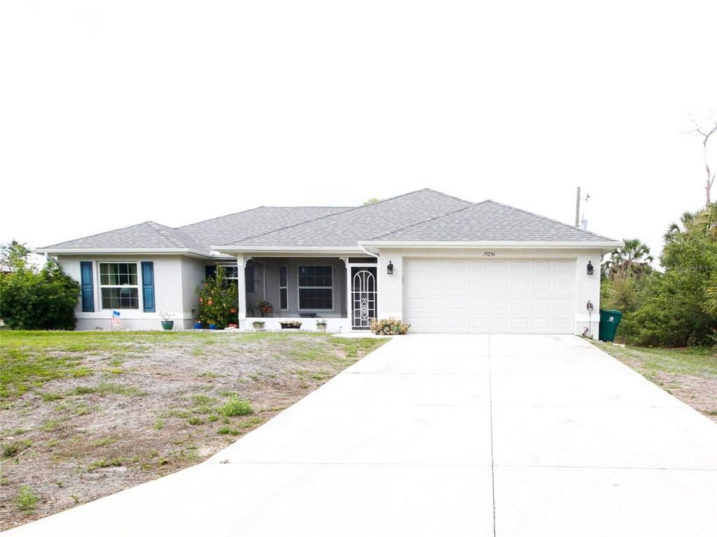Photo of 15256 Community Avenue, Port Charlotte, FL 33953 (MLS # TB8492294)