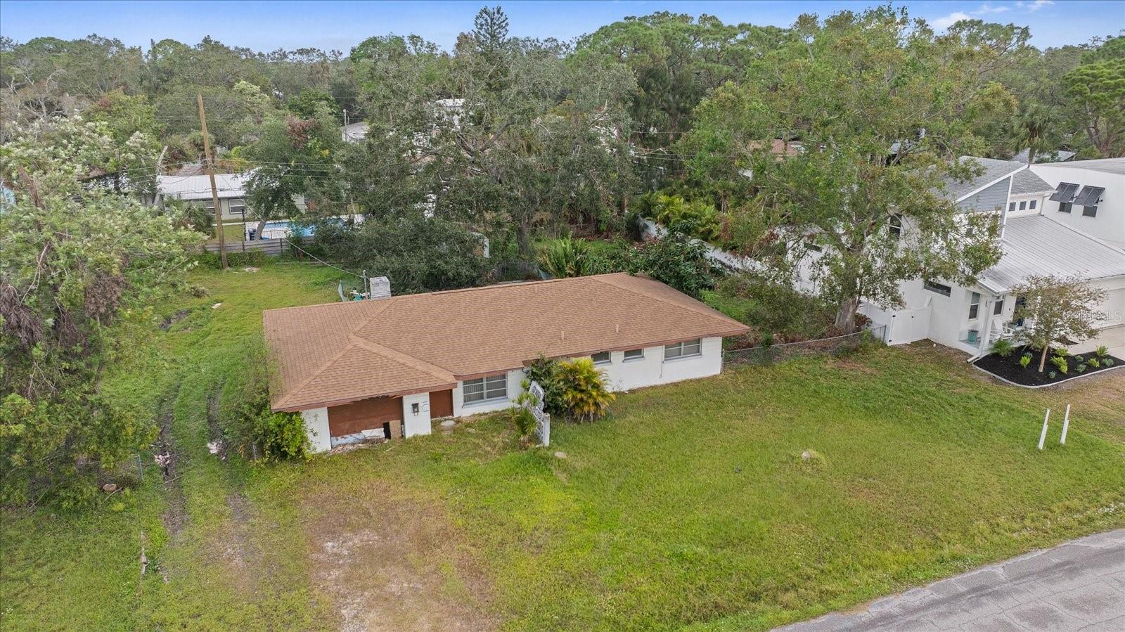 Prime Real Estate Opportunity: ½ Acre Lot with Tear-Down Potential for Multi-Family Development. Unlock the full potential of this expansive ½ acre lot, ideally located in a thriving neighborhood with strong growth prospects. Currently home to a single-family residence, this property offers a rare opportunity to tear down the existing structure and rebuild a multi-family development, making it a perfect choice for investors, developers, or builders looking to capitalize on the area's increasing demand for housing. The large lot provides ample space for multiple units, with plenty of room for parking, landscaping, and outdoor amenities. Zoning allows for high-density residential use, enabling you to create a modern, income-generating property or a high-end residential complex. Whether you're looking to build luxury townhomes, apartments, or a mixed-use space, this location offers the flexibility to bring your vision to life. Situated in a desirable, well-established community with excellent access to local shops, schools, parks, and major transportation routes, this property ensures both convenience and long-term value. Don't miss out on this exceptional investment opportunity! Contact us today to explore the possibilities and schedule a viewing.