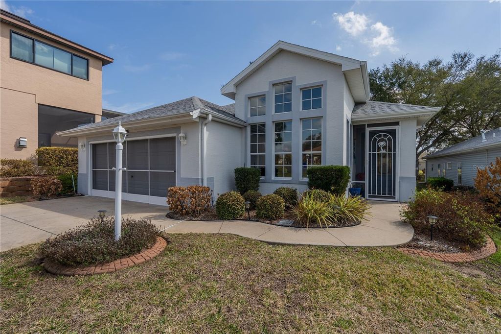 Photo of 6210 Sailboat Avenue, Tavares, FL 32778 (MLS # OM719416)