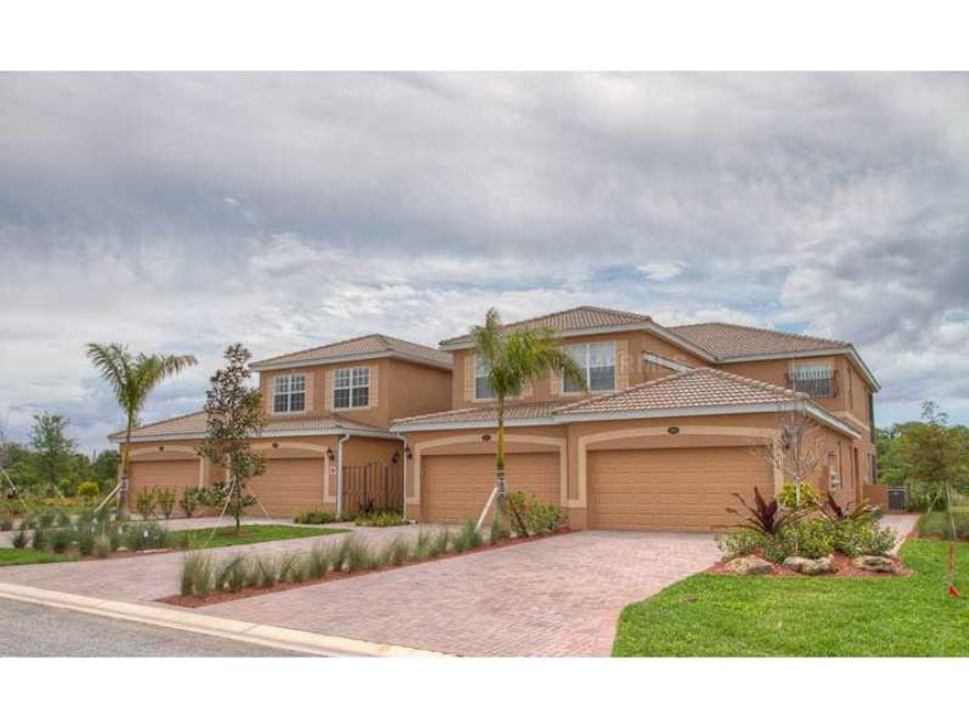 A beautiful furnished Coach Home in highly sought after River Strand Golf & Country Club. This well appointed upstairs home has it all! 3 bedrooms and 2 bathrooms, separate dining room, eat in kitchen, laundry room with washer and dryer and a 2+ car garage!  King in Master Bedroom, Queen Bed in 2nd and 3rd Bedrooms. Enjoy the serene and private lake views from your screened lanai as you watch the sunset. Enjoy tennis, golf, fitness, resort style pools, fine dining at the clubhouse. One time membership fee of $575 allows use of amenities. Sorry, no pets allowed. AVAILABLE FOR 2025 OFF SEASON MONTHS $4000.  ALREADY BOOKED FOR 2026 SEASON