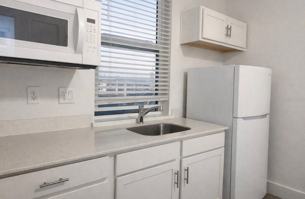 Photo of 13025 Michael Callin Alley, Orlando, FL 32828 (MLS # O6376729)