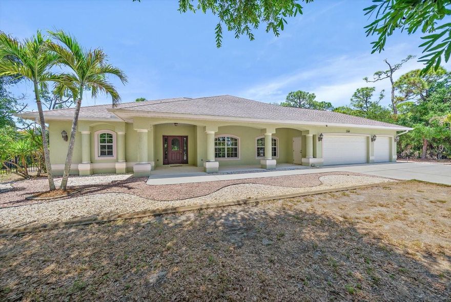 Custom-built by Newport Homes and set on 1.67 acres in Englewood, Florida, 630 Old Englewood Road offers the rare combination of privacy, space, functionality, and true Florida lifestyle living. This thoughtfully designed, split plan 3 bedroom plus office/den, 2 bathroom residence features 2,200 square feet of living space, a 3-car garage, vaulted ceilings, an indoor laundry room, and a spacious kitchen with abundant cabinetry, a breakfast bar and separate formal dining room. A large covered front porch creates a welcoming first impression, while the screened and covered rear patio opens to a private pool area designed for relaxing, entertaining, and enjoying the quiet natural surroundings.

The property is especially well suited for buyers who need room for hobbies, vehicles, tools, equipment, or additional storage. In addition to the attached 3-car garage, the home includes a separate workshop with HVAC, electricity, an overhead door, setup for a woodworking vacuum system, and an extra storage shed. A large separate aluminum carport provides even more covered space for boats, trailers, recreational vehicles, or additional parking. A whole-home generator adds an important layer of comfort and preparedness.

Located along Old Englewood Road in Sarasota County, this property places you near the best of Englewood’s Gulf Coast lifestyle while still offering the space and flexibility that is increasingly hard to find. Enjoy proximity to Historic Dearborn Street, local restaurants, farmers markets, boutique shopping, golf courses, marinas, Lemon Bay, Manasota Key, Englewood Beach, Blind Pass Beach, and Stump Pass Beach State Park. With easy access to Venice, North Port, Wellen Park, and area medical, retail, and recreation destinations, this home offers a strong blend of acreage, convenience, coastal access, and everyday livability.

630 Old Englewood Road is ideal for those searching for a custom home in Englewood FL with acreage, a pool home near Manasota Key beaches, a residence with a workshop and 3-car garage, or a private Sarasota County property with room to live, work, create, store, and unwind.