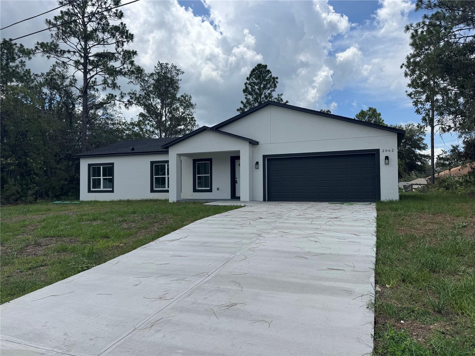 Brand New Construction – Move-In Ready! ?
This stunning 3-bedroom, 2-bathroom home in Citrus Springs offers the perfect blend of comfort and modern living. Featuring an open and airy floor plan with luxury vinyl plank flooring throughout, this home is designed with both style and functionality in mind.
The kitchen showcases shaker-style cabinets, quartz countertops, and a full stainless-steel appliance package — perfect for any home chef. The bathrooms are beautifully finished with ceramic tile showers up to the ceiling, and the master suite includes a double shower for a spa-like experience.
Additional features include:
?? High-efficiency A/C
?? Interior laundry room with sink
?? Spacious front porch
Located in the heart of Citrus Springs, just minutes from natural springs, rivers, shopping, and dining — enjoy a high-quality lifestyle surrounded by Florida’s Nature Coast beauty.
?? Total SqFt: 1,856 | New Construction | No HOA
Don’t miss this opportunity! Message me for more details or to schedule your private tour ??