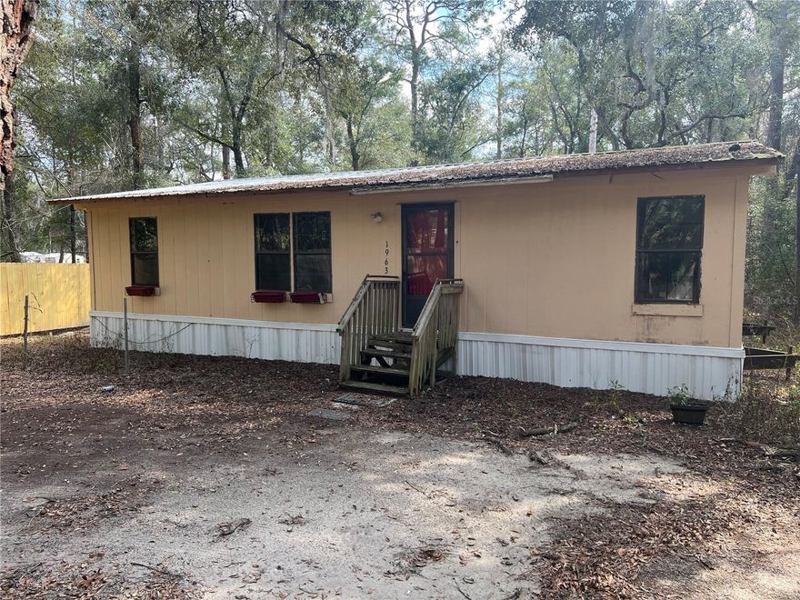 *HANDYMAN SPECIAL* This 3-bedroom, 2-bathroom 1,080 sq ft double wide manufactured home offers an excellent opportunity for those looking to invest in a property with immense potential. Located right on the serene shores of North Twin Lake, the home spans 1,080 square feet and sits nestled on 2.06 acres. Zoned Agricultural. Inside, you'll find a spacious layout, although some areas will require attention, as several floors are in need of repairs and the fridge/oven is not in place. The home features central heat and air for year-round comfort. Outside, a small storage shed conveys with the property, providing additional space for your tools or outdoor gear. The property also includes a durable metal roof, offering peace of mind for years to come. Whether you’re looking to renovate and make it your own or seeking a lakefront retreat to restore, this home is full of promise. Don't miss the chance to own a piece of waterfront property with endless potential. Schedule your tour today!